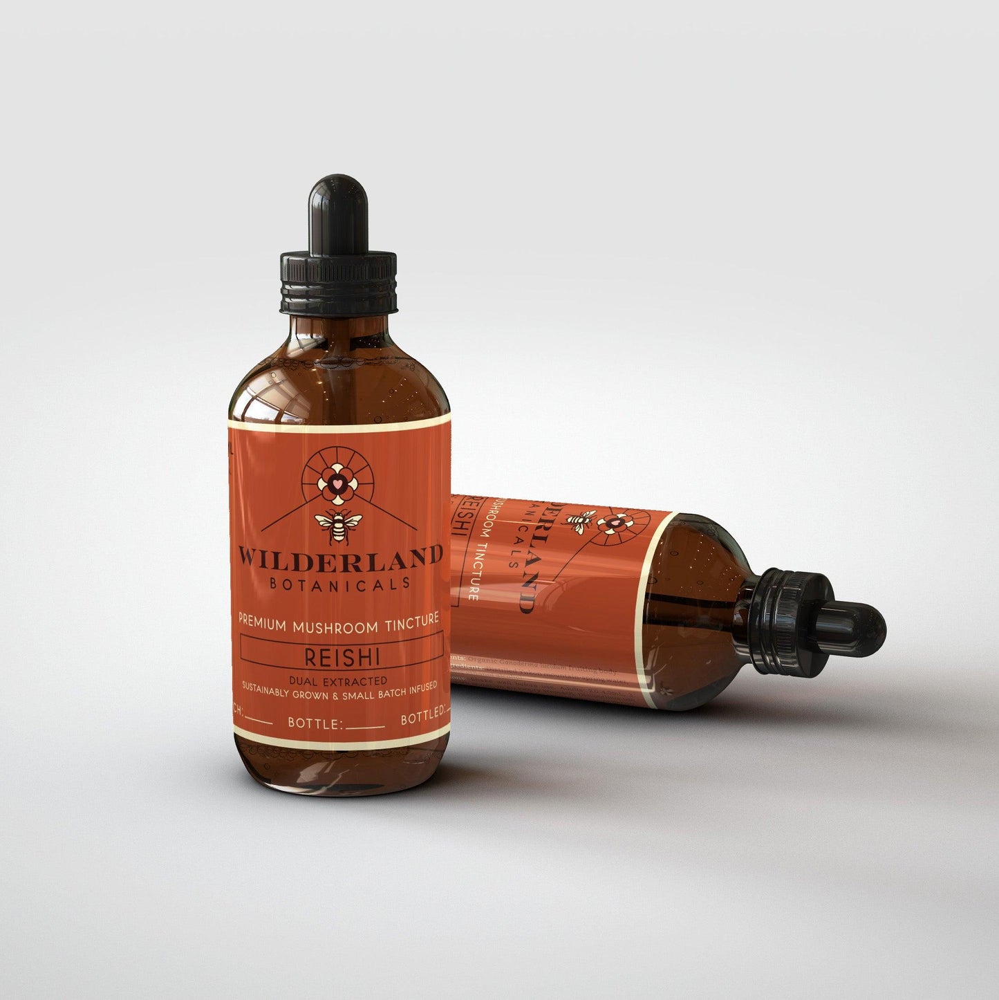 2x100ml reishi tincture bottles square